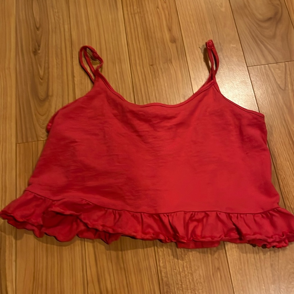 American Eagle red adjustable strap ruffle bottom shirt